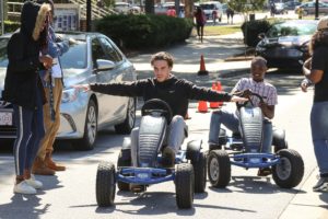 Students on pedal bikes during Yard Fest