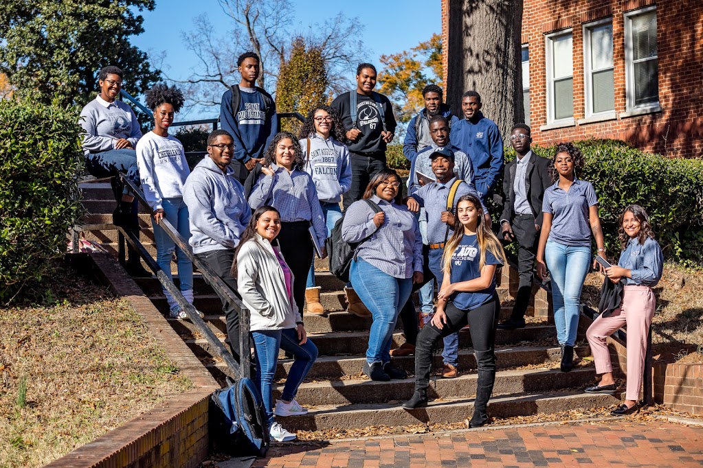 Students posing on steps in SAU apparel